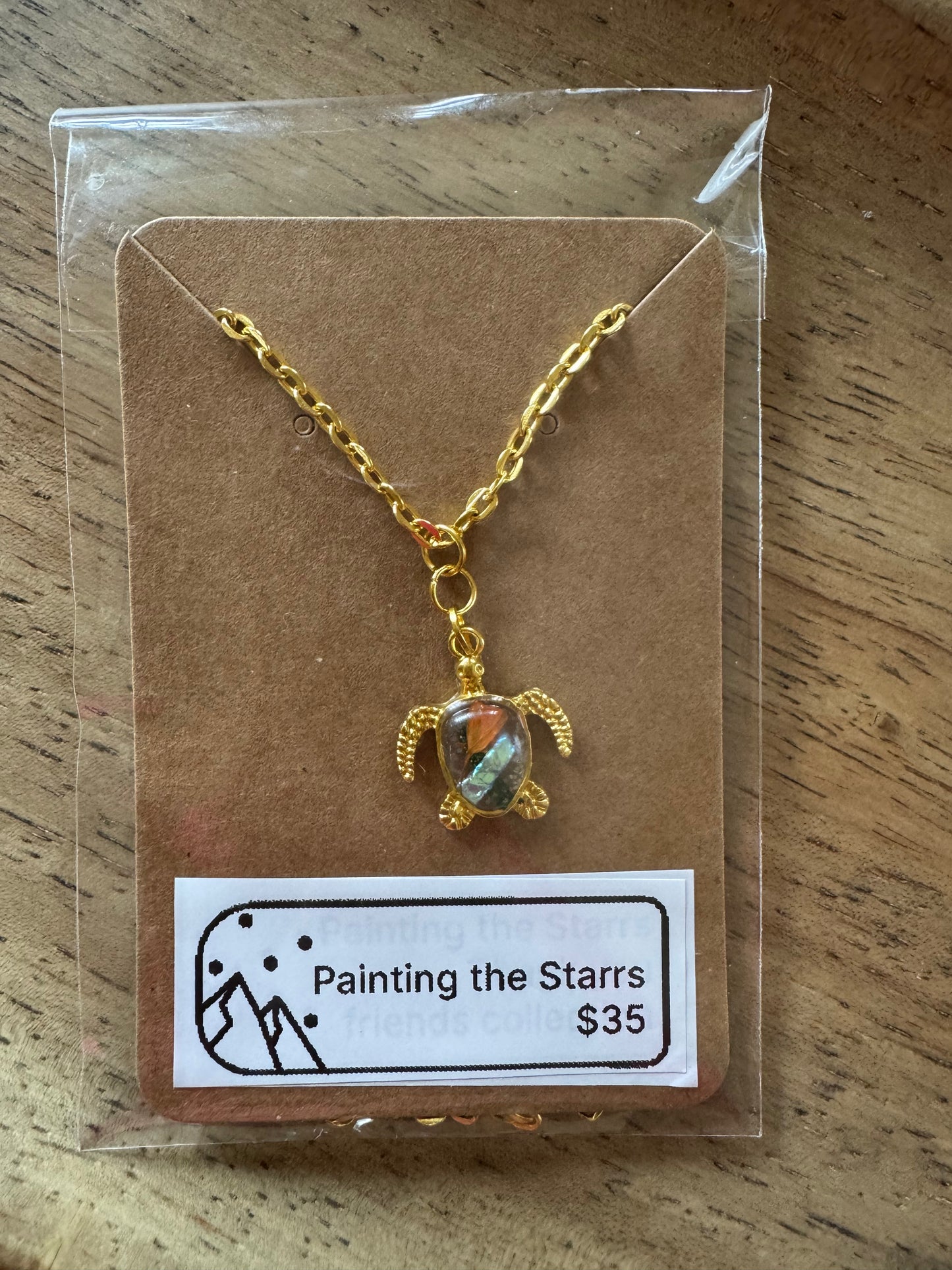 Turtle pendant with resin and orange flower