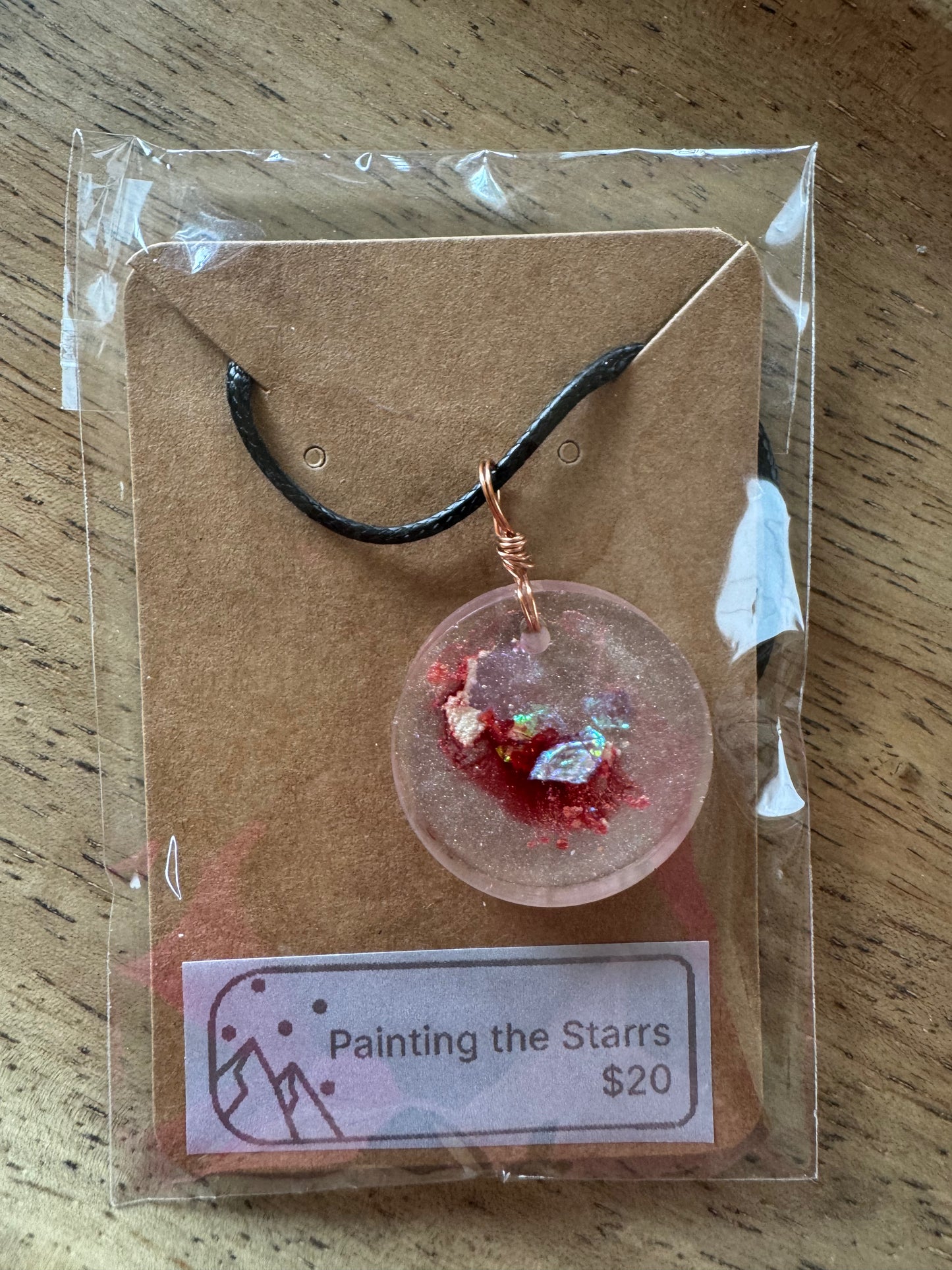 Resin in clear circle with sparkles