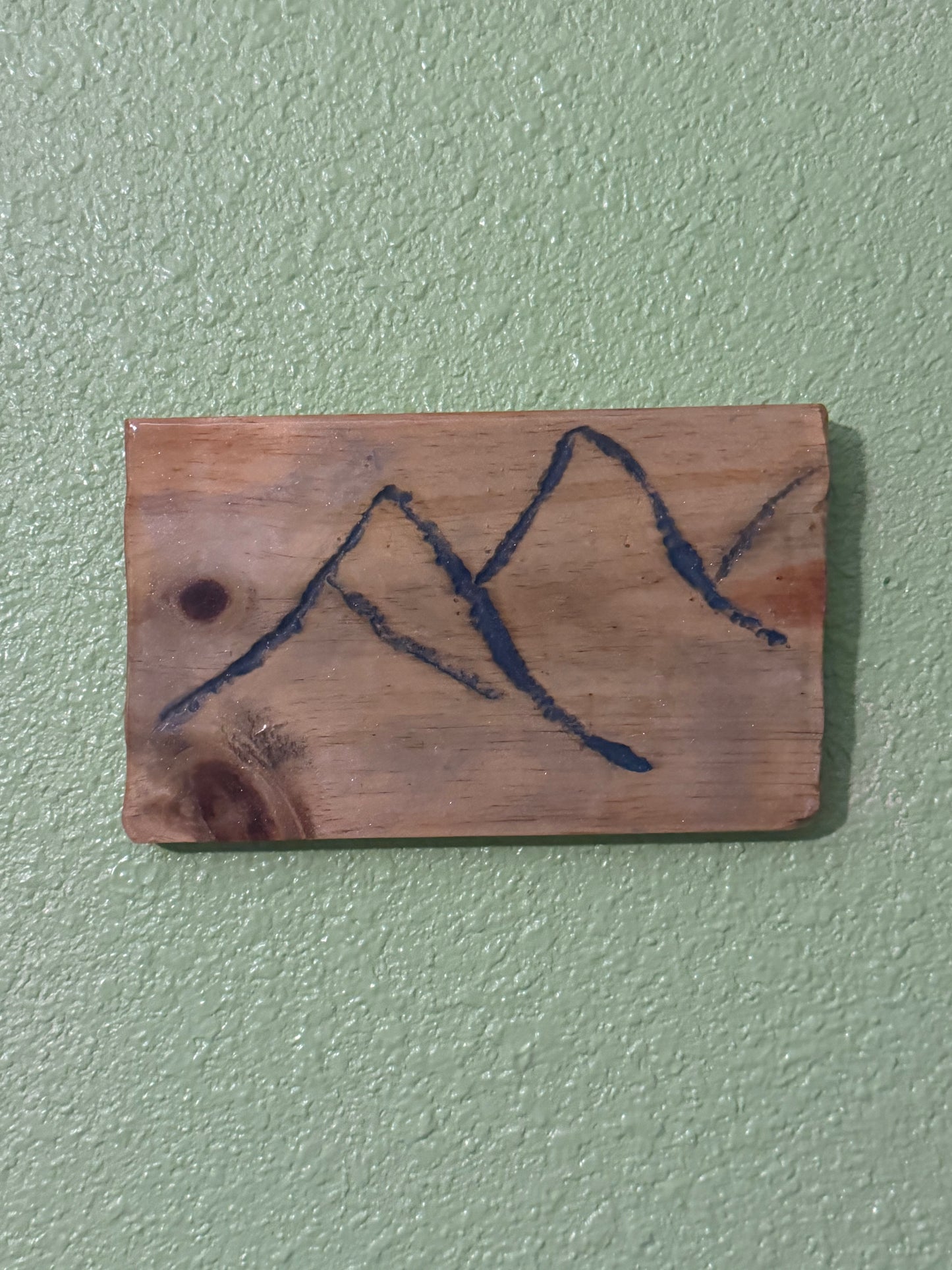 Engraved Mountains filled with blue resin on wood panel (version 1)