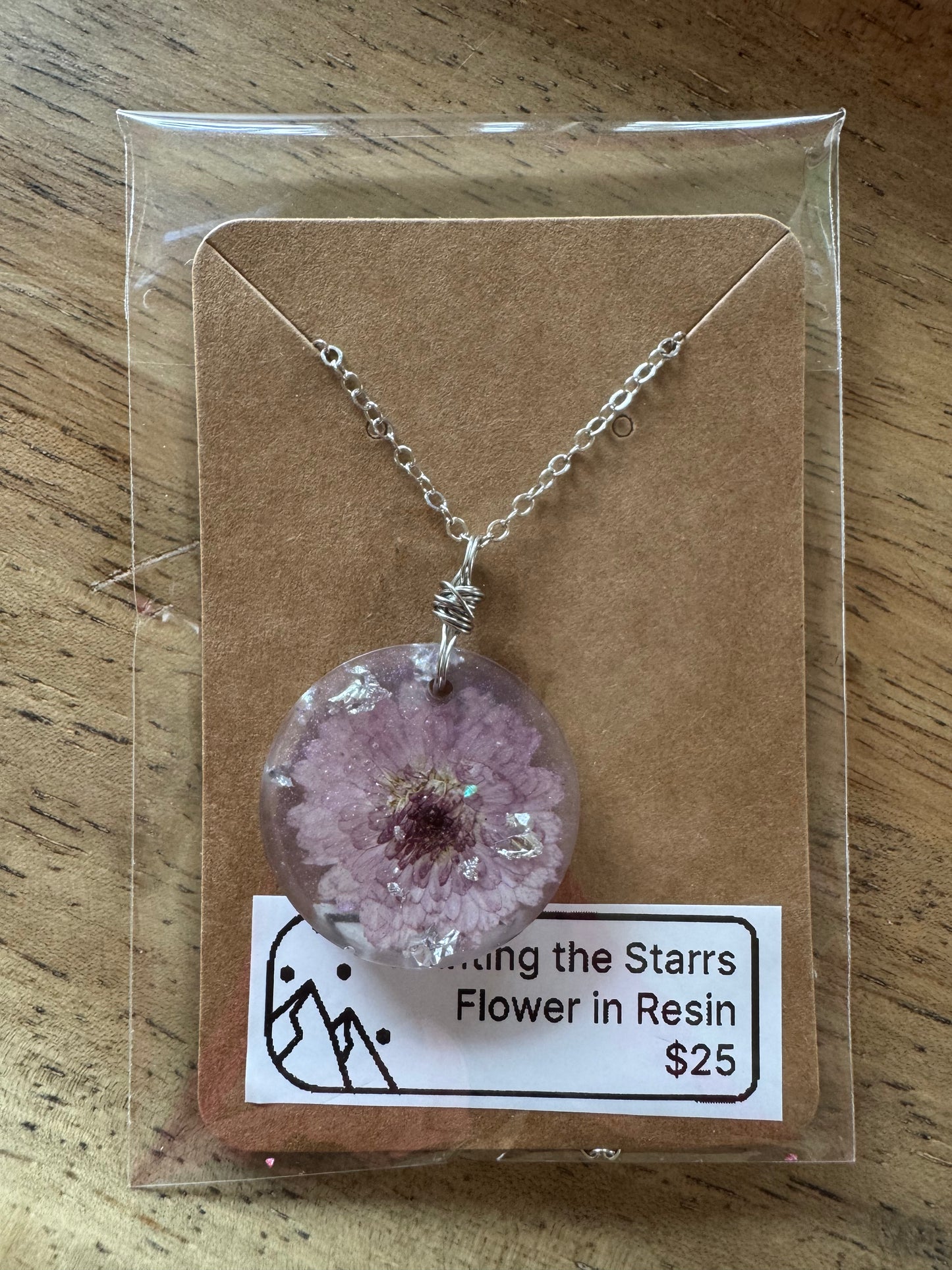 Purple flower in resin