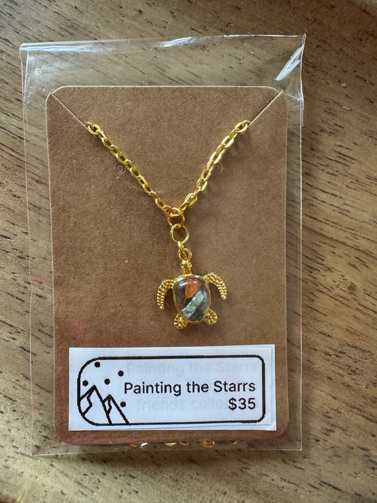 Turtle pendant with resin and orange flower