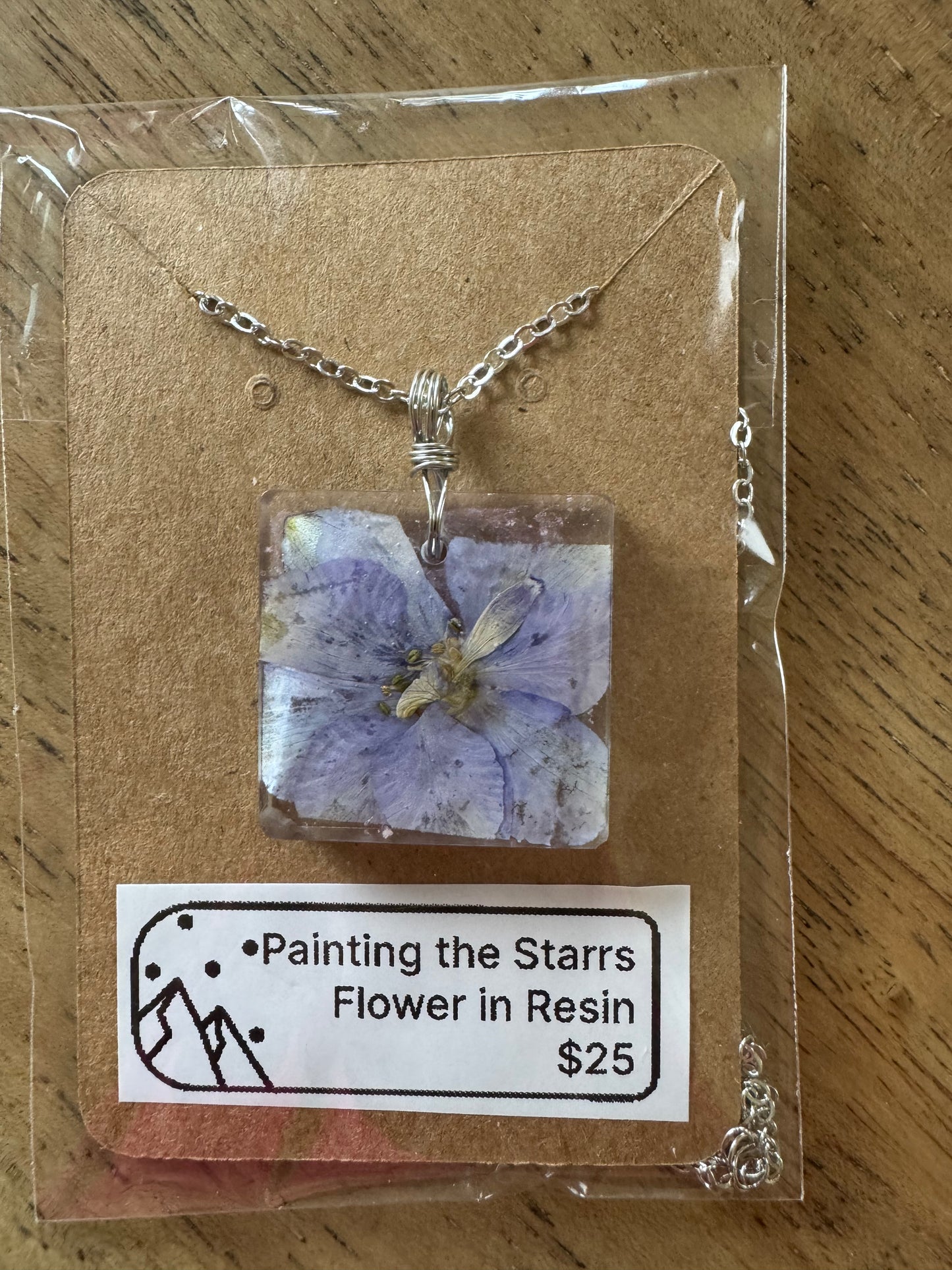 Purple flower in resin