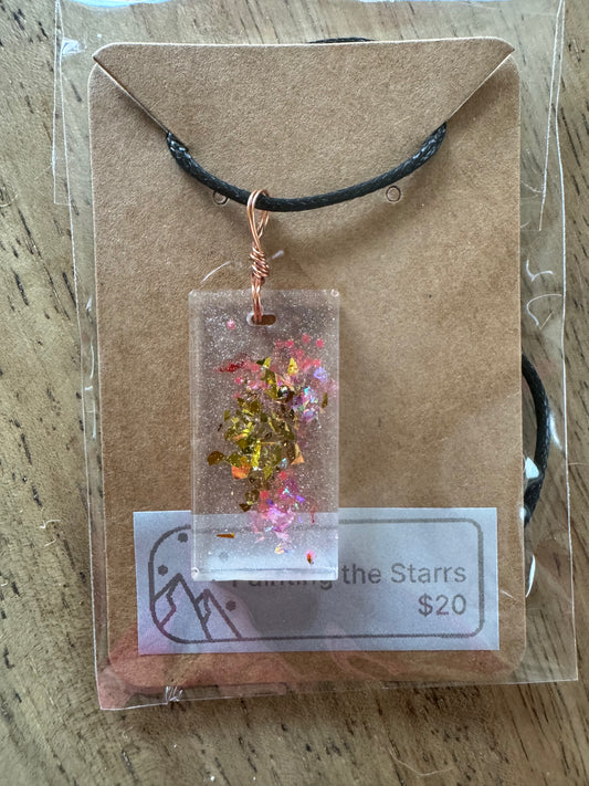 Pink and gold flecks in resin