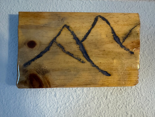 Engraved Mountains filled with blue resin on wood panel  (version 1)